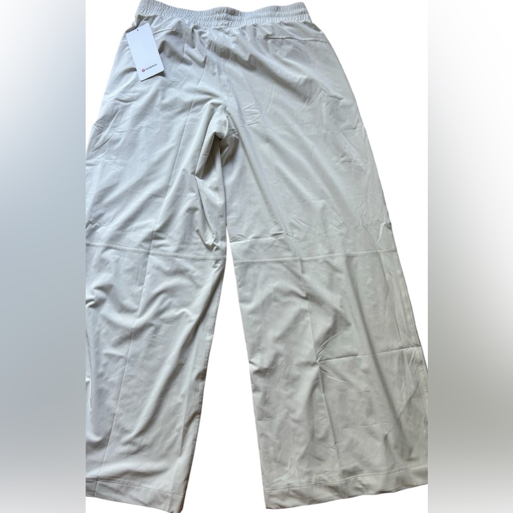 NWOT LULULEMON Swift Wide Leg Mid-Rise Lined Pant size 12  Bone Relaxed Fit.